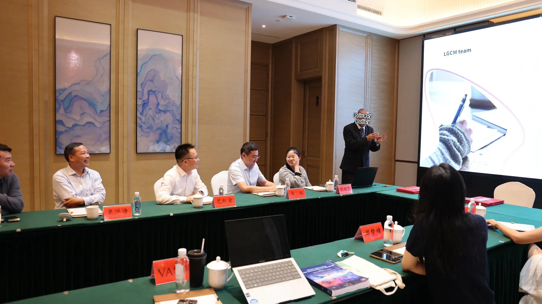 Academician giving a collective lecture to participants