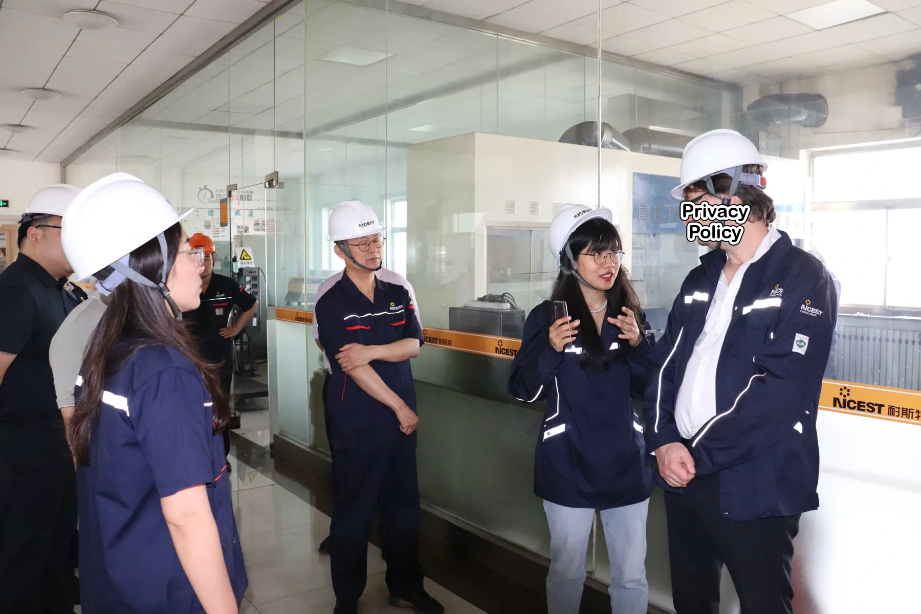 Expert discussing findings with staff during the site visit